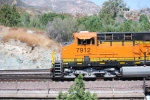 BNSF 7912's Conductor waves to me as they proceed south on their journey to San Bernardino, Ca with a loaded Vehicle Train.